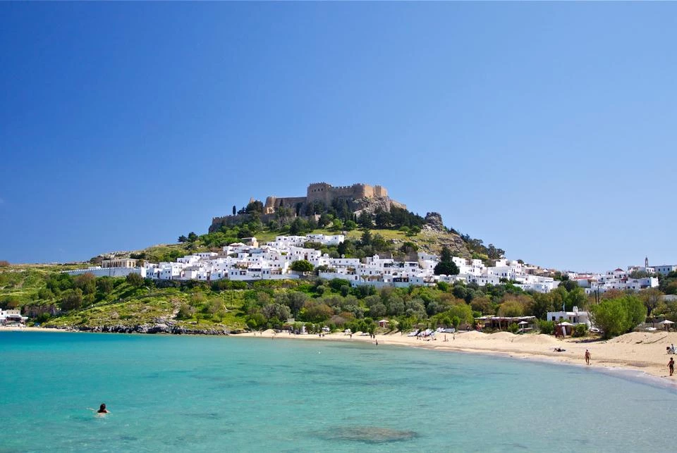 Lindos-with-the-castle-above-on-the-Greek-Island-of-Rhodes-031914E9B7EDB2AF