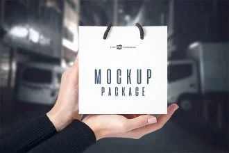 3 Little Bags in Hands Free PSD Mockup